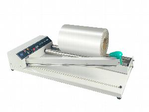 ЗАПАЙЩИК ПАКЕТОВ PACKVAC IS-500 С ДЕРЖАТЕЛЕМ РУЛОНОВ С ОБРЕЗКОЙ